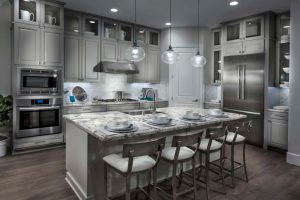 This metallic kitchen at The Enclave in Dublin, CA is one of our hot 2018 design trends.
