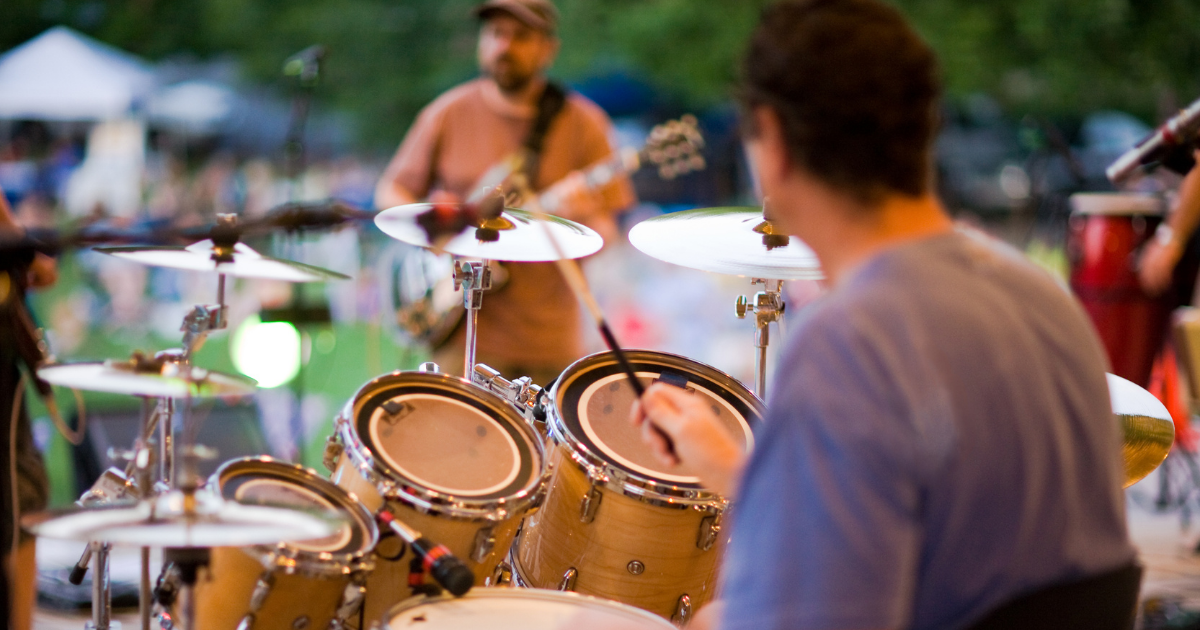 Band playing in outdoor amphitheater 