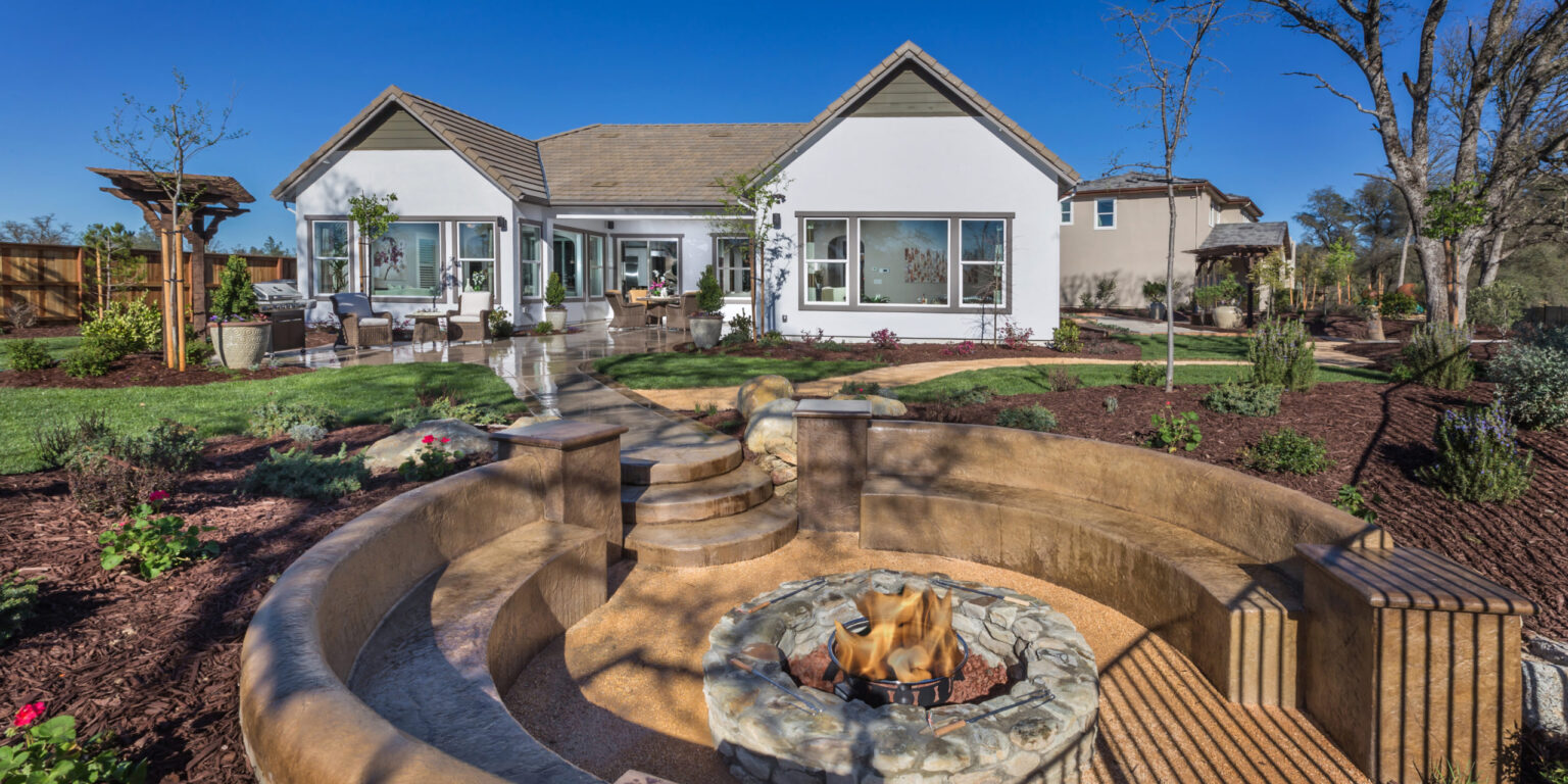 Perfect Summer BBQ area in Tim Lewis Home backyard.